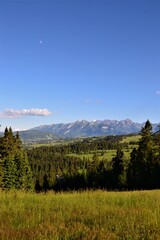 Tatra Mountains panorama. Gorgeous mountain range with high rocky peaks. Beautiful view from Kotelnica mountain. Bialka Tatrzanska, Podhale, Poland. High Tatra summits.