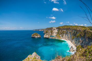 Diamond beach with blue ocean, sky and cliff in Nusa Penida island