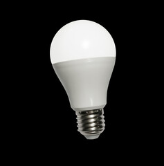 LED bulb isolated on dark background. Copy space. Idea concept