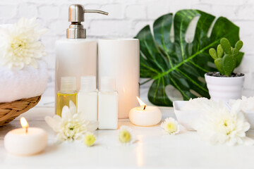 Fototapeta na wymiar Spa beauty massage health wellness. Spa Thai therapy treatment aromatherapy for body woman with white flower nature candle for relax and summer time.