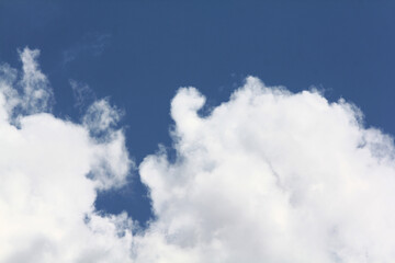 Blank sky surface with small clouds