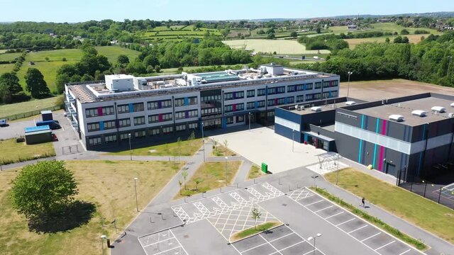 Cleckheaton UK, 29th May 2020: Aerial drone photo of the Whitcliffe Mount Primary School, showing an aerial photo of the British school building on a bright sunny summers day
