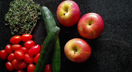 A small variety of fruits and vegetables that have just arrived from the organic fair.