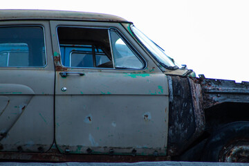 Old Soviet cars in disassembled condition, the body of old rare cars