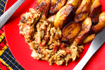 A meal of fried ripe plantain and scrambled eggs. This is usually served as breakfast in some restaurants as requested.