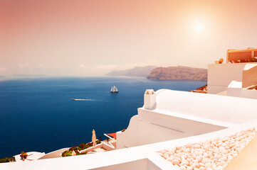 Beautiful sunset in Oia town in Santorini island, Greece. Famous travel destination