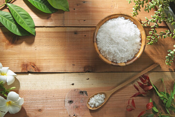 Sea salt in wooden bowl and spoon 