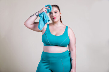 Plus size women making sport and fitness.