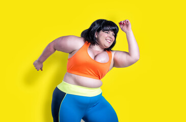 Plus size woman making sport and fitness