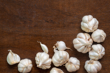 Garlic placed on a wooden table