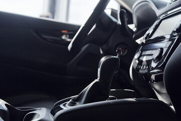 Steering wheel and front panel. Modern new luxury automobile interior. Design and technology
