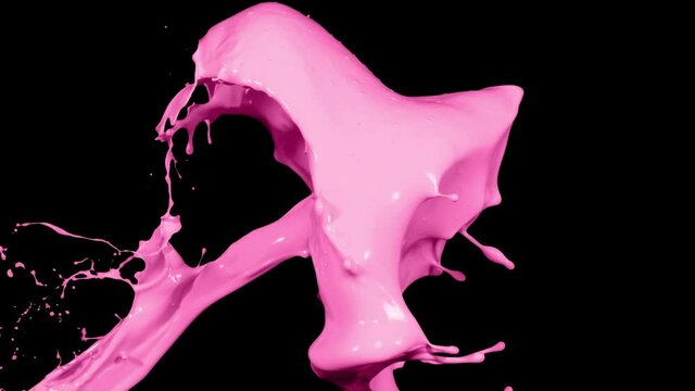 Pink paint splash thrown in slow motion, liquid isolated on black (4K)