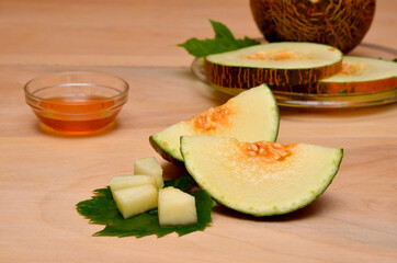 beautiful still life with sliced ​​pieces of melon on the table