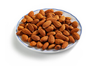 peeled almonds on a white saucer with a blue border, isolated on a white background