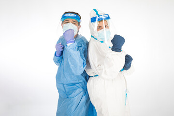 Man wearing PPE and Woman doctor wearing PPE to fight coronavirus, prepared to fight, on white background. Warrior. COVID medicine concept