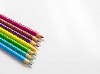 Fototapeta premium colored pencils on white background