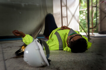 Accident at work of construction worker at site. Builder accident falls scaffolding on floor,...