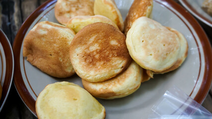pukis snack. indonesian street food made from flour eggs yeast and coconut milk