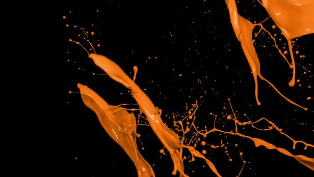 Orange paint splash thrown in slow motion, liquid isolated on black (4K)
