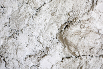 Obraz na płótnie Canvas Abstract stone wall. White dirty surface. Dirty texture