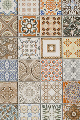 Imitation of colorful ceramic tiles on wall