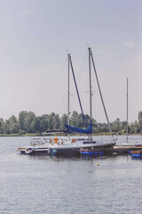 Fototapeta premium sailing boats in the harbor. Yacht club, yachts on the lake 