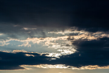 Dramatic cloud filled dark stormy sky