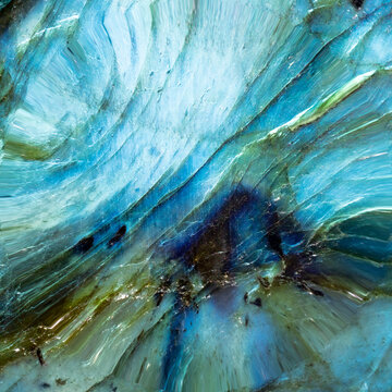 Macro photo of a colorful and textured labradorite stone.