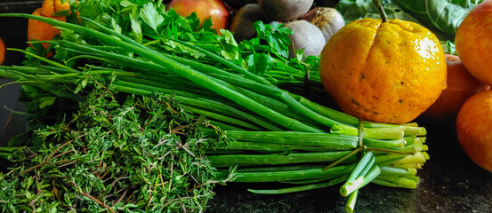 A small variety of fruits and vegetables that have just arrived from the organic fair.