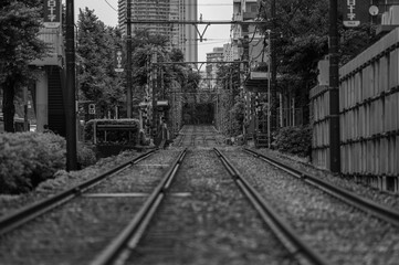 Fototapeta na wymiar railway in the monochrome city 