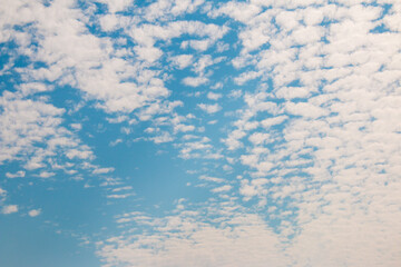 Blue Sky Background with White Clouds. Altocumulus cloud during the day