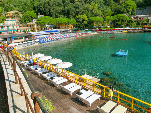 Portofino, Italy - September 16, 2019: beach known as paraggi near portofino in genoa on a blue sky and sea background
