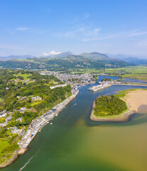 Fototapeta premium Porthmadog and surrounding beaches, marina with lots of yachts and boats at high tide. North Wales