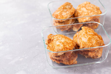 Meal prepping. Fried meat in a glass container. Copy space.