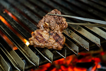 Grilling meat. Grill, meat and fire