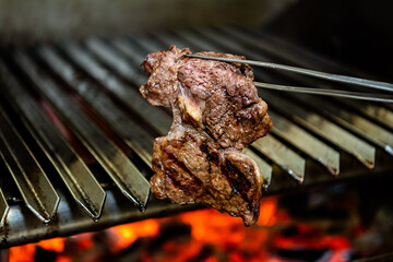 Grilling meat. Grill, meat and fire