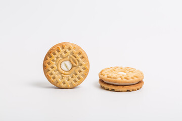 Cream sandwich biscuits on white background