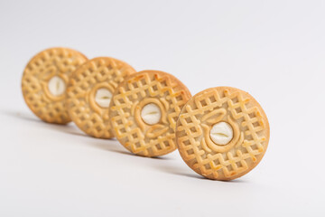 Cream sandwich biscuits on white background