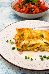 A piece of freshly baked lasagna with a toasted crust