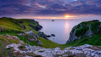 Summer sunset over The Rumps and Pentire Head on the North Coast of Cornwall, UK