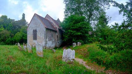 Obraz premium St Mary's Church in Chithurst on the River Rother, West Sueex, UK