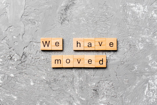 we have moved word written on wood block. we have moved text on cement table for your desing, concept