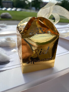 Eid Adha Mubarak for Muslim community around the world.
Happy energetic photo of Eid gifts and goody bags for Muslims in front of the Masjid.