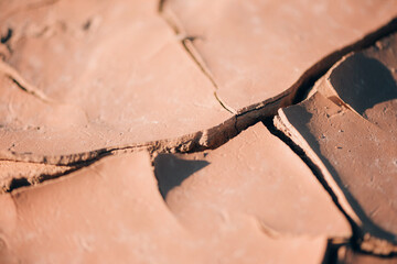 Dry land ground. Global warming problem. Desert concept. Cracked soil caused by dehydration. Water crisis. Cracked earth