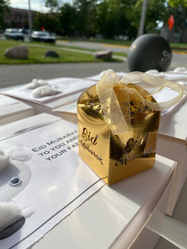 Eid Adha Mubarak for Muslim community around the world.
Happy energetic photo of Eid gifts and goody bags for Muslims in front of the Masjid.