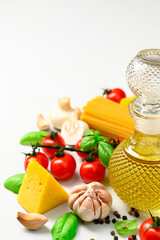 Set of products for cooking Italian pasta with mushrooms on a light gray background. Copy space, vertical orientation.