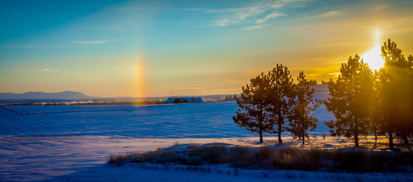 Unique Image of Backyard Rainbow Sun Dog during a Sunrise on a Very Cold (-36 F) Montana Winter Morning.