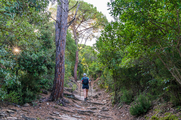 Treekking at dawn leaving Girona with a hiker on the way.