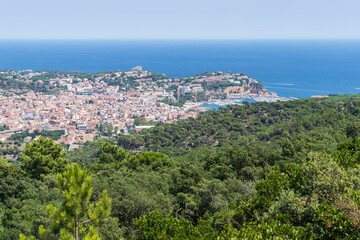 Views of the Mediterranean Sea and the city of Sant Feliu dels Guixols from the "Massis de les Cadiretes".