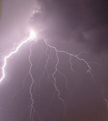 Lightning in the sky at night as an  background.
